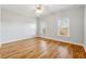 Inviting bedroom with hardwood flooring and natural light at 2195 Lake Shore Lndg, Alpharetta, GA 30005