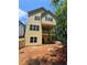 Exterior rear elevation view of new two-story home with a deck at 1664 Crestridge Se Dr, Marietta, GA 30067