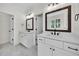 Bathroom with double vanity and modern mirrors at 1664 Crestridge Se Dr, Marietta, GA 30067