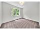 Bedroom with carpet, natural light, and neutral walls at 1664 Crestridge Se Dr, Marietta, GA 30067