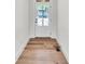 Entryway with hardwood floors and white door at 1664 Crestridge Se Dr, Marietta, GA 30067