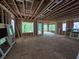 Bright, unfinished space with large windows, providing ample natural light and views of the surrounding landscape at 1664 Crestridge Se Dr, Marietta, GA 30067