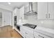Bright kitchen with stainless steel appliances, white cabinets, subway tile backsplash, and stone countertops at 1664 Crestridge Se Dr, Marietta, GA 30067