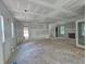 Spacious living room with unfinished walls and exposed flooring at 1664 Crestridge Se Dr, Marietta, GA 30067