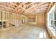 Unfinished basement with exposed framing, offers the opportunity to customize the space at 1664 Crestridge Se Dr, Marietta, GA 30067