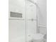 Contemporary bathroom featuring a glass-enclosed shower, integrated shower caddy, and toilet at 1220 Hightower Nw Rd, Atlanta, GA 30318
