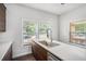 Modern kitchen with stone countertops, stylish cabinetry, and stainless steel appliances at 1220 Hightower Nw Rd, Atlanta, GA 30318