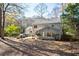 House with backyard, patio, and wooded area at 1111 Valley Ridge Se Ct, Marietta, GA 30067