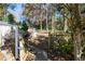 Backyard with stone pathway and wooden fence at 1111 Valley Ridge Se Ct, Marietta, GA 30067