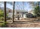 House with backyard, patio, and wooded area at 1111 Valley Ridge Se Ct, Marietta, GA 30067