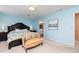 Main bedroom with ensuite bathroom and light blue walls at 1111 Valley Ridge Se Ct, Marietta, GA 30067