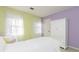 Bright bedroom with double windows and a white wardrobe at 1111 Valley Ridge Se Ct, Marietta, GA 30067