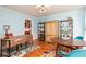 Dining area with a workspace and light blue walls at 1111 Valley Ridge Se Ct, Marietta, GA 30067