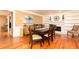 Spacious dining room featuring hardwood floors and built-in shelving at 1111 Valley Ridge Se Ct, Marietta, GA 30067