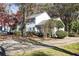 Two-story house with blue shutters and a driveway, surrounded by trees at 1111 Valley Ridge Se Ct, Marietta, GA 30067