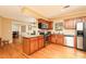 Updated kitchen, featuring granite countertops and wood cabinets at 1111 Valley Ridge Se Ct, Marietta, GA 30067