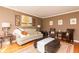 Living room with hardwood floors, neutral walls, and comfy seating at 1111 Valley Ridge Se Ct, Marietta, GA 30067