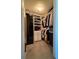 Spacious walk-in closet with ample shelving and hanging space at 1100 Howell Mill Nw Rd # 304, Atlanta, GA 30318