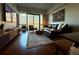 Modern living room with hardwood floors and city views at 1100 Howell Mill Nw Rd # 304, Atlanta, GA 30318