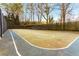 Multi-purpose court with basketball hoop and markings at 2012 Variations Ne Dr, Atlanta, GA 30329