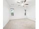 Bright bedroom with ceiling fan and neutral carpeting at 2012 Variations Ne Dr, Atlanta, GA 30329