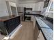 Modern kitchen with stainless steel appliances and granite countertops at 2012 Variations Ne Dr, Atlanta, GA 30329