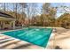 Community pool with lifeguard station and surrounding trees at 2012 Variations Ne Dr, Atlanta, GA 30329