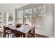 Bright dining room features a wood table with six chairs and large windows at 1122 Westchester Ne Rdg, Atlanta, GA 30329