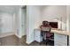 Convenient home office with built-in desk and chair near entryway at 1122 Westchester Ne Rdg, Atlanta, GA 30329