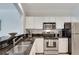 Modern kitchen with stainless steel appliances and granite counters at 1122 Westchester Ne Rdg, Atlanta, GA 30329