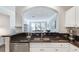 Kitchen with granite countertop and stainless steel dishwasher at 1122 Westchester Ne Rdg, Atlanta, GA 30329