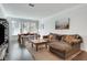 Spacious living room with hardwood floors and sectional sofa at 1122 Westchester Ne Rdg, Atlanta, GA 30329
