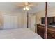 Main bedroom with large closet and TV at 1750 Terrace Lake Dr, Lawrenceville, GA 30043