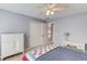 Bedroom with double doors leading to a loft area at 1750 Terrace Lake Dr, Lawrenceville, GA 30043