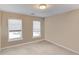 Spacious bedroom with neutral walls and carpet at 1750 Terrace Lake Dr, Lawrenceville, GA 30043