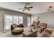 Bright living room with ample seating near kitchen at 1750 Terrace Lake Dr, Lawrenceville, GA 30043