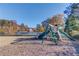 Playground near a lake with homes in the background at 1750 Terrace Lake Dr, Lawrenceville, GA 30043