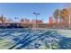 Community tennis court with lights and net at 1750 Terrace Lake Dr, Lawrenceville, GA 30043