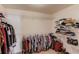 Large walk-in closet with ample hanging space and shelving at 1750 Terrace Lake Dr, Lawrenceville, GA 30043