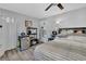 Cozy bedroom featuring a ceiling fan, wood-look flooring, and ample storage solutions for a comfortable living space at 361 W Post Oak Sw Xing, Marietta, GA 30008