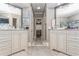 Luxurious main bathroom with dual vanities, granite counters, and walk in shower at 4738 Ivy Ridge Se Dr, Atlanta, GA 30339