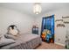 bedroom with plush toys and storage shelving at 51 Jennifer Ln, Rydal, GA 30171