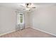 Simple bedroom with carpeted floor and window at 51 Jennifer Ln, Rydal, GA 30171