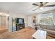 Living room with sectional sofa, fireplace, and access to hallway at 51 Jennifer Ln, Rydal, GA 30171