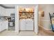 Walk-in pantry with washer and dryer, and ample shelving at 51 Jennifer Ln, Rydal, GA 30171