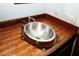 Unique bathroom featuring a copper penny countertop and a vessel sink at 8441 Lake Dr, Snellville, GA 30039