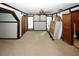 Spacious bedroom with a ceiling fan and lots of natural light at 8441 Lake Dr, Snellville, GA 30039