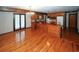 Open concept dining area with hardwood floors and chandelier at 8441 Lake Dr, Snellville, GA 30039