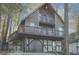 Secluded A-frame home in wooded area with deck at 8441 Lake Dr, Snellville, GA 30039