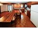 Spacious kitchen featuring a large island and wood flooring at 8441 Lake Dr, Snellville, GA 30039